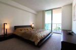 Spacious unfurnished one-bedroom apartment in Sunny Isles with modern decor and balcony views