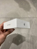 Factory Sealed - Apple AirPods with Charging Case