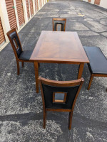 Table with 3 chairs and one bench