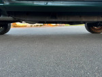 Undercarriage view of a well-maintained Chevrolet truck with zero rust and new engine components.