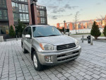 2001 Toyota RAV4 SUV in silver with clean interior and alloy wheels, parked in an urban setting.