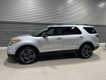 2013 Ford Explorer Sport AWD in silver with black rims, showcasing its sleek design and spacious interior.