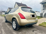 2007 Nissan Murano S FWD in excellent condition with brand new snow tires parked on a residential street.