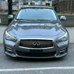 Front view of a gray INFINITI Q50 Premium with leather interior, sunroof, and heated seats.