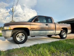 2001 Dodge Ram 1500 V8 Laramie SLT pickup truck for sale, showing side profile and clean exterior.
