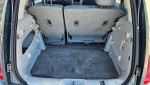 Interior rear of a 2006 Chrysler PT Cruiser showing spacious cargo area with folded seats.