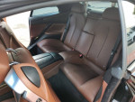 Interior view of a 2014 BMW 6 Series 640i convertible with brown leather seats