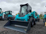 SWL3220 loader with Kubota V3307 engine and 4 in 1 bucket in a display area