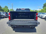 Rear view of a 2022 Chevrolet Silverado 1500 Limited Custom Trail Boss with open truck bed.