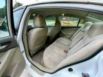 Interior view of 2008 Nissan Altima 2.5 showing clean back seats and spacious cabin.