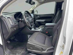 Interior view of a well-maintained 2020 Chevrolet Colorado LT truck showing black seats and dashboard.