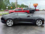2022 Chevrolet Camaro 1SS in black color, supercharged V8 engine, showcasing sleek design at a dealership.