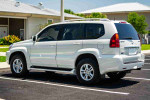 2007 Lexus GX 470 SUV in Blizzard Pearl color, showcasing luxury features and 4-wheel drive capability.