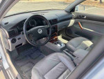 Interior of a 2003 Volkswagen Passat GLX with leather seats and dashboard controls
