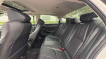 Interior view of the 2018 Honda Accord EX-L with spacious black leather seating and modern design.