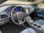 Interior view of a 2016 Chrysler 200S featuring blue leather seats, navigation system and modern dashboard design.