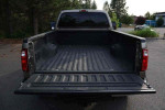 2005 Ford F-250 Super Duty XLT truck bed with a clean, spacious interior for hauling cargo