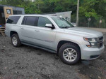 2019 Chevrolet Suburban LS for sale, silver SUV with 74,564 miles, normal wear and 4x4 capability.
