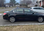 2012 Honda Accord EX-L in black color parked, featuring 168,000 miles, in excellent condition for $1,500.