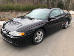 2004 Chevrolet Monte Carlo SS Intimidator Limited Edition in excellent condition, showcasing sleek black design and sporty features.