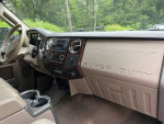 Interior view of a 2010 Ford F350 Dually Super Duty with modern dashboard and controls