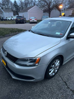 2011 Volkswagen Jetta for sale with 130,000 miles, featuring a clean exterior and leather interior.
