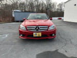 2010 Mercedes-Benz C300 Sport 4Matic in red color, showcasing front view, ideal for car enthusiasts and buyers.