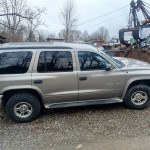 2000 Dodge Durango SLT for sale, silver, with new tires and third-row seating, 195,000 miles, excellent condition.