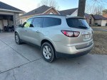 2013 Chevrolet Traverse LT AWD parked in driveway with no body damage and good interior condition.