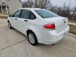2011 Ford Focus SE in excellent condition, low miles with new tires and brakes, parked on a driveway.