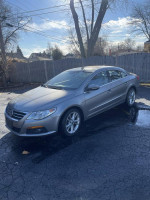2010 Volkswagen CC sedan in gray color, parked on a driveway, ready for inspection and test drive.