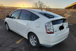 2007 Toyota Prius parked, showing exterior details and sunset in background, for sale at $6900 with 146,000 miles