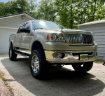 2006 Lincoln Mark LT in mint condition, 4x4 Crew Cab with 44,000 original miles and custom suspension lift.
