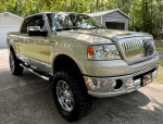 2006 Lincoln Mark LT in mint condition, 4x4 crew cab with 44,000 original miles, showcasing a polished exterior.