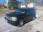 2003 GMC Yukon Denali AWD in black, well-maintained with new brakes, tires, and power features.