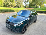 2019 Land Rover Range Rover Supercharged SUV in rare SVO green with luxury features and 22-inch black wheels.