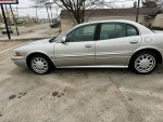 2004 Buick LeSabre Custom in silver, well-maintained with 50,000 miles, remote start, clean condition.