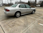 2004 Buick LeSabre Custom, silver sedan, garage-kept, low mileage, in excellent condition.
