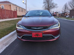 Front view of a 2015 Chrysler 200 Limited in maroon color, ideal for rideshare with low mileage.
