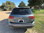 Rear view of a gray 2018 Volkswagen Tiguan SE 4Motion AWD parked on a grassy area.
