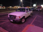 2011 Ford Ranger XL RWD parked at night, showcasing its clean condition and sleek design.