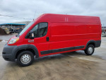 2015 Ram Promaster 2500 high roof van in red with 190,788 miles, well-maintained, ready for sale.