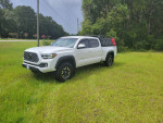 2021 Toyota Tacoma TRD Offroad parked on grassy field, excellent condition, original owner, highway miles