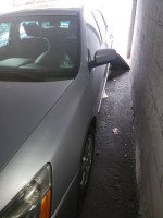 2005 Honda Accord with damaged rear driver side, not drivable, ideal for parts such as engine and transmission.