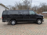 2010 Ford E-350 cargo van with 82,000 miles in excellent condition, ideal for transporting goods or passengers.