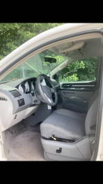 Interior view of a 2009 Dodge Grand Caravan with accessible features for wheelchair mobility.