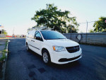 2013 Ram C/V Tradesman Cargo Van with roof racks parked on street, 127k miles, clean title.