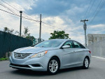 2011 Hyundai Sonata GLS in silver color parked on a street with no accidents and 48 service records.
