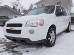 2007 Chevrolet Uplander parked in snow, featuring 137,000 miles and in great condition.