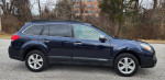 2014 Subaru Outback 2.5i AWD in Deep Indigo Pearl parked outdoors